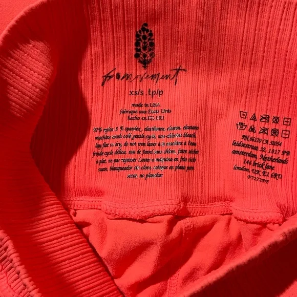 21. New FP Movement Good Karma Leggings in Neon Coral - Picture 5 of 6
